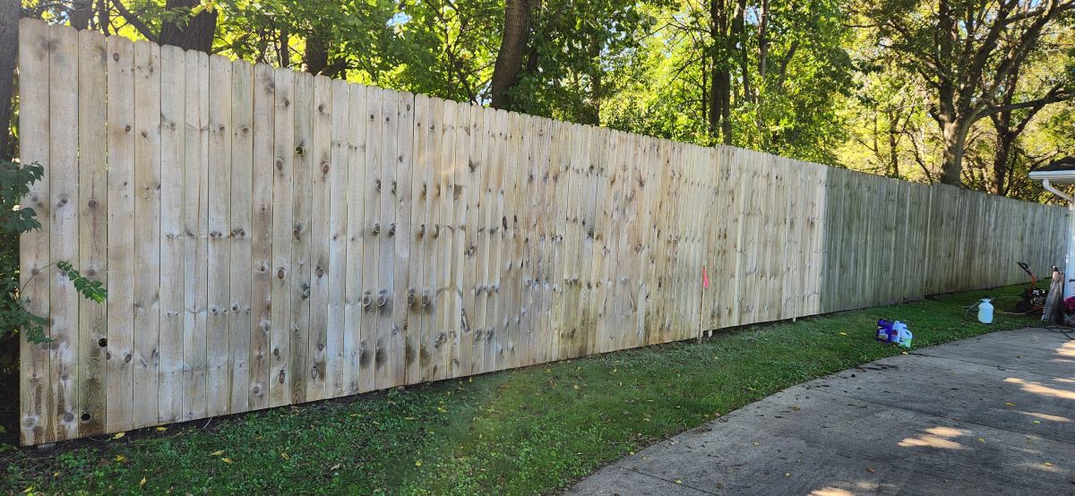 You can see the old fence started looking brand new!